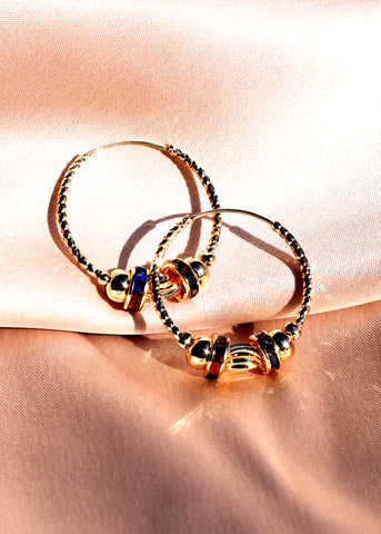 The "Isal" triple heart dangle earrings