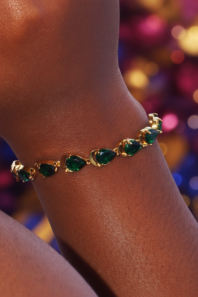 Adjua pear shape emerald tennis bracelet on-wrist lifestyle