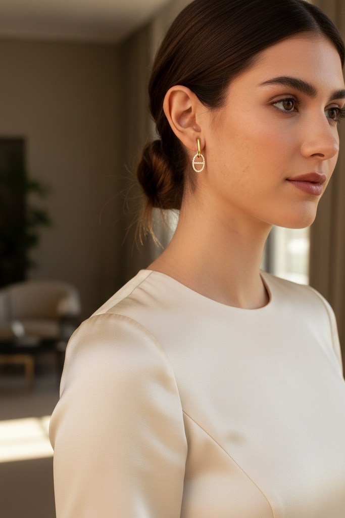 Addison gold diamond drop earrings styled with elegant evening outfit