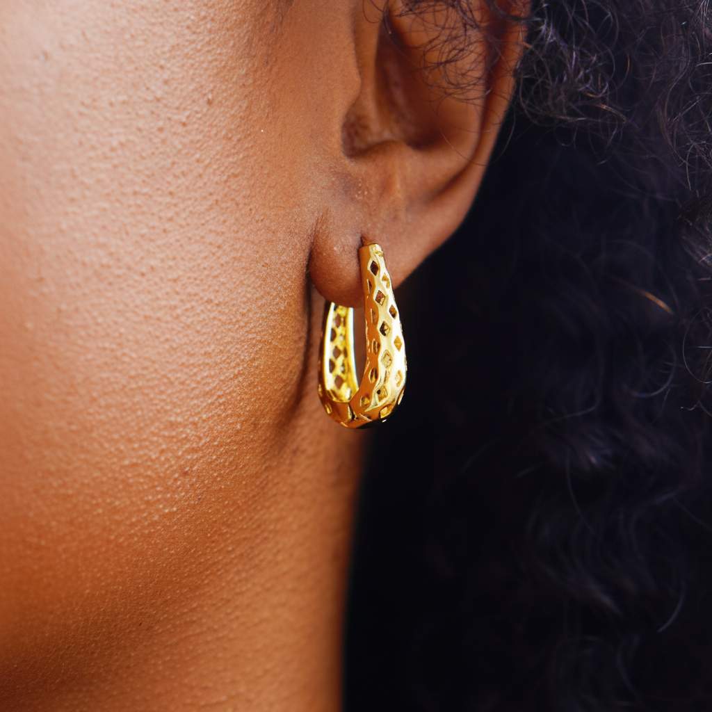Tallulah gold filigree huggie hoop earrings close-up cutout detail