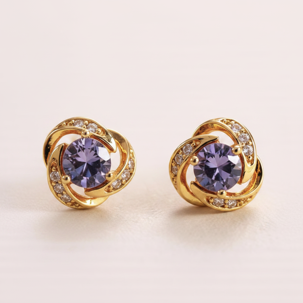 Langlet gold-plated purple crystal stud earrings close-up macro detail shot