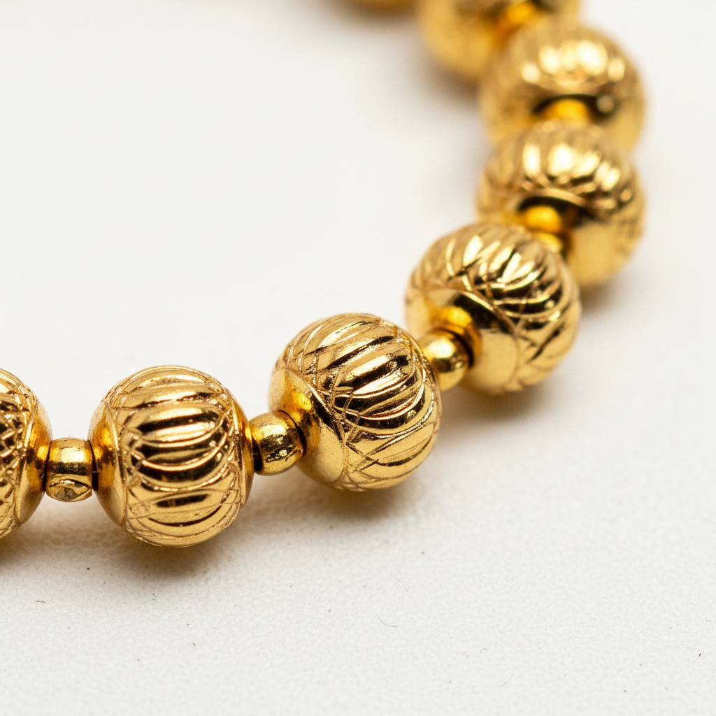 Eleanor gold diamond-cut ball bead bracelet close-up bead detail
