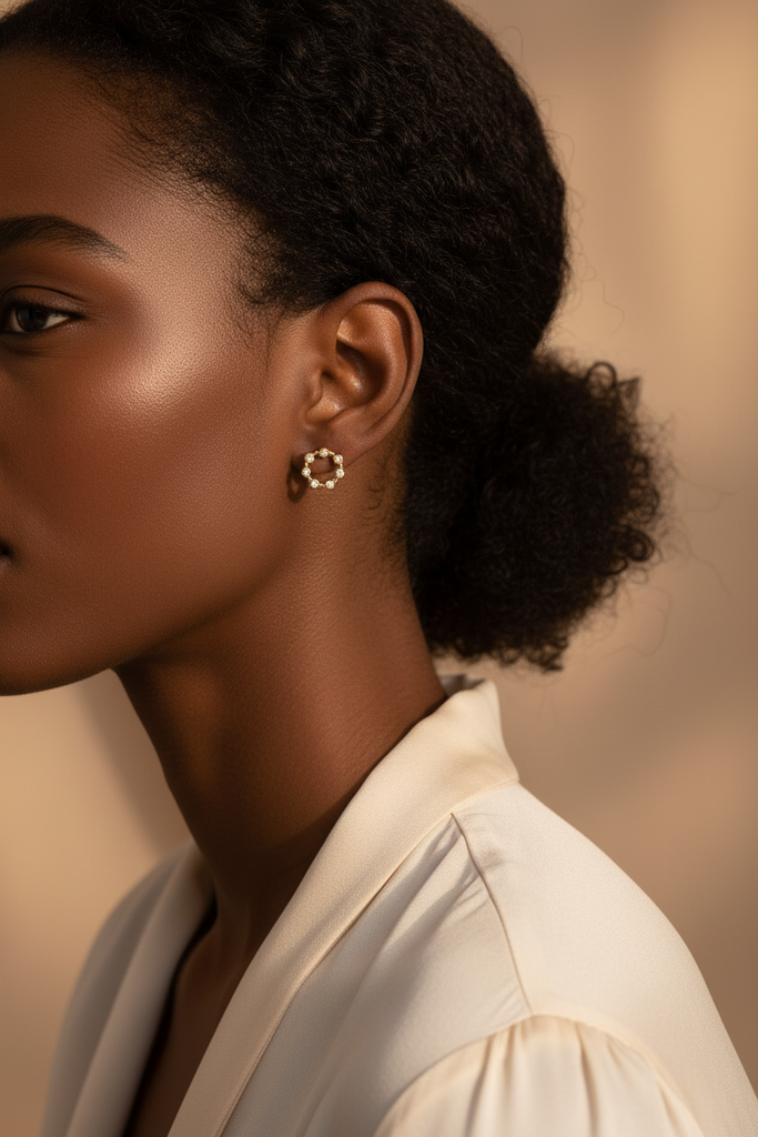 Savannah gold crystal stud earrings on-ear lifestyle editorial shot