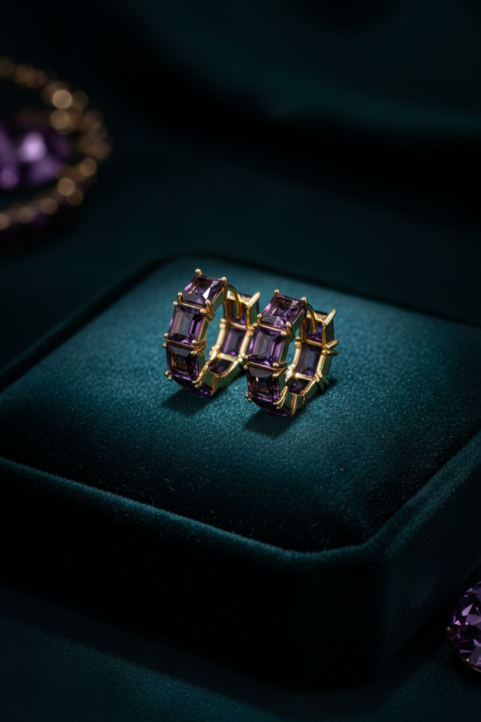 Kennedy purple amethyst stone huggie hoop earrings on dark velvet tray