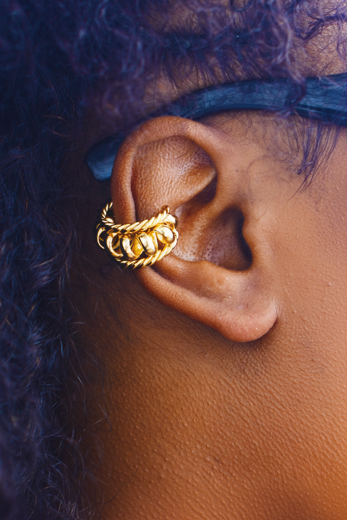 Kai gold multi-strand braided ear cuff on cartilage lifestyle shot