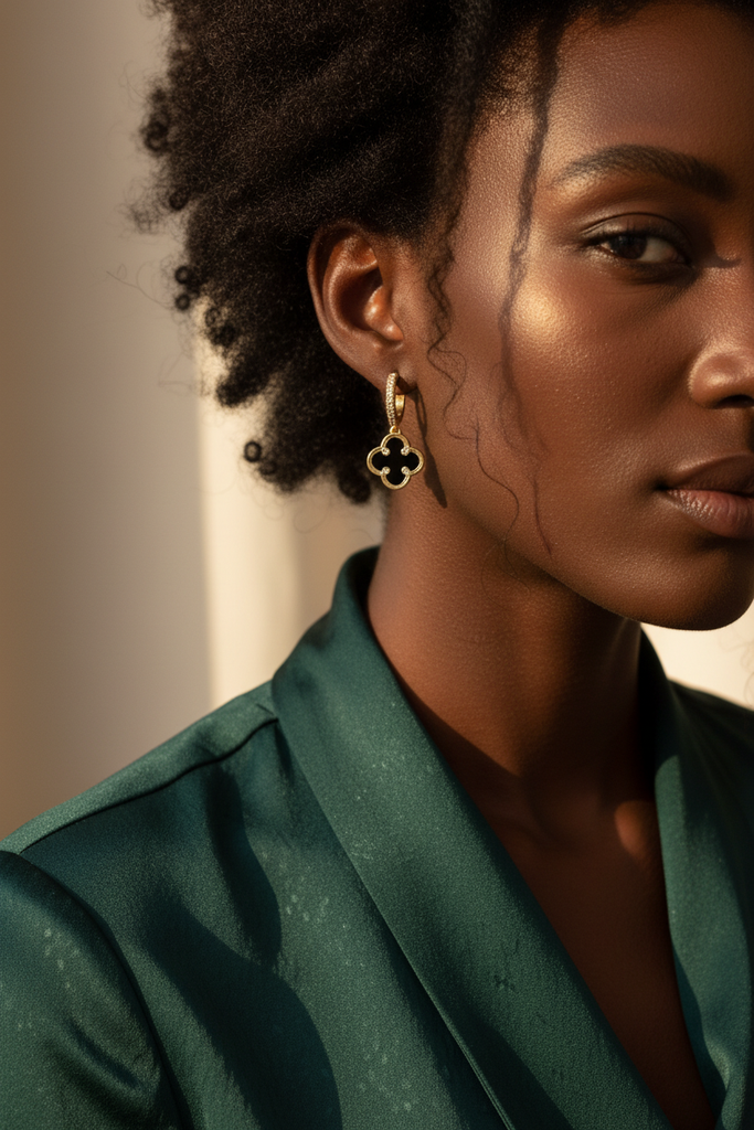 Madrid floral motif drop earrings black resin worn on ear lifestyle shot