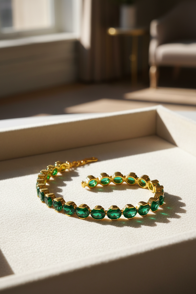 Chepi oval emerald tennis bracelet cream velvet tray display
