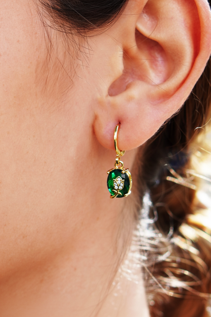 London emerald and rose drop earrings on-ear romantic lifestyle shot