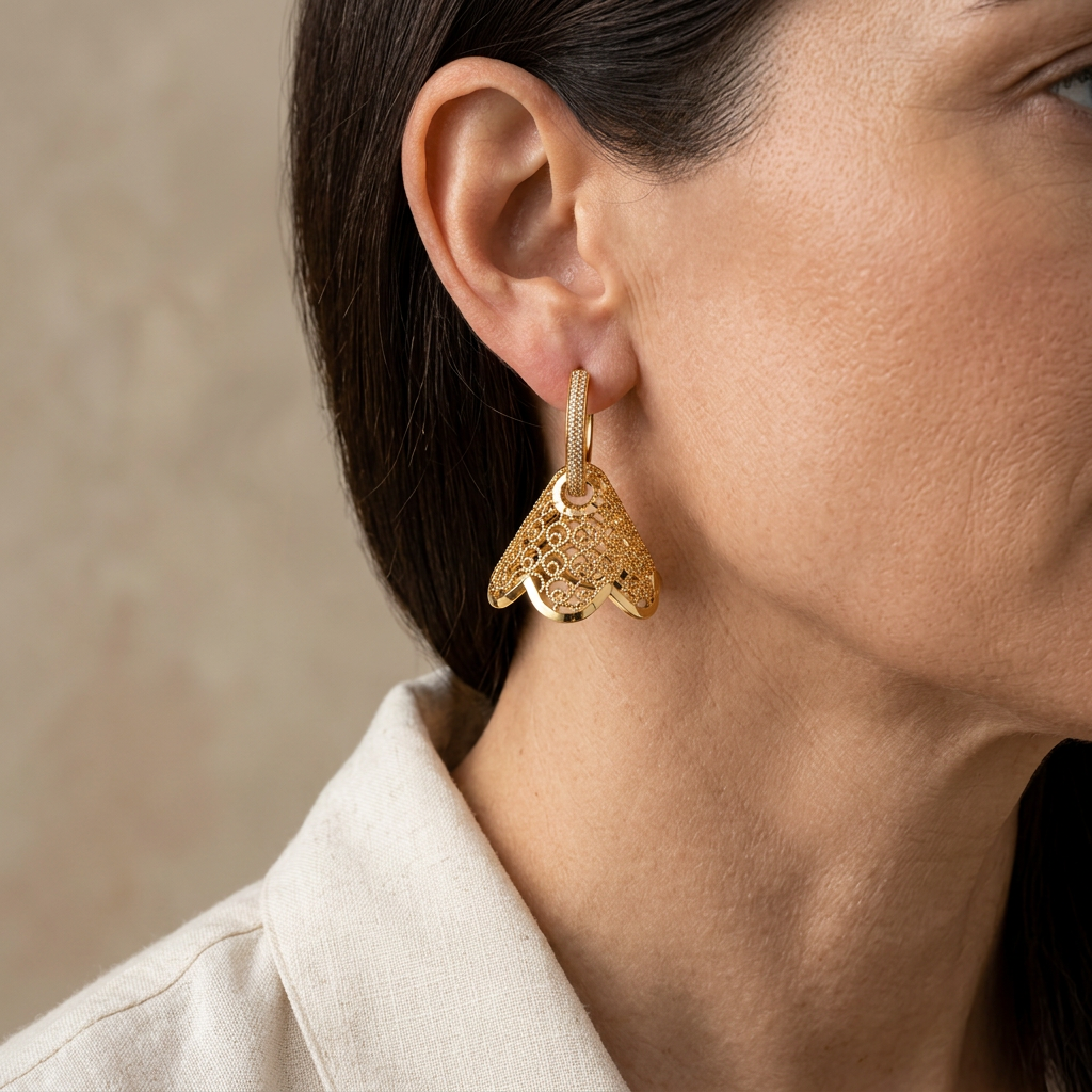 Prescott filigree dangle earring worn with cream styling