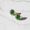 Belvedere Green Stud Earrings flat lay on white marble