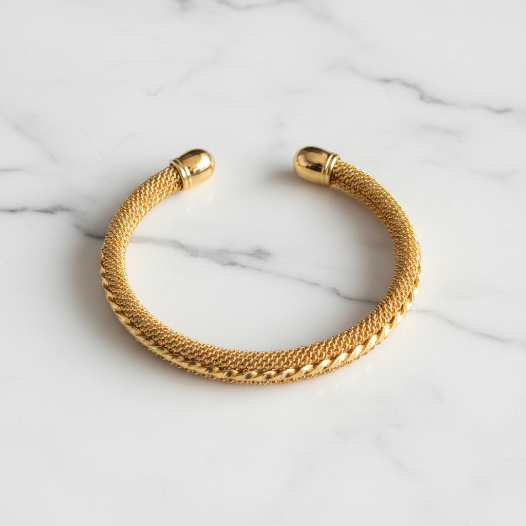 Venice gold mesh cuff bracelet flat lay on white marble