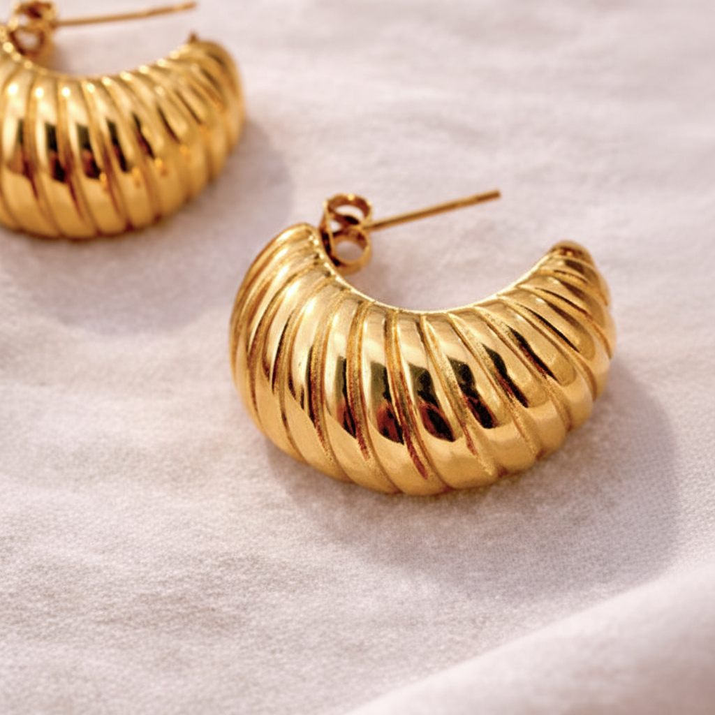 Zurich gold shrimp hoop earrings close-up ribbed texture detail