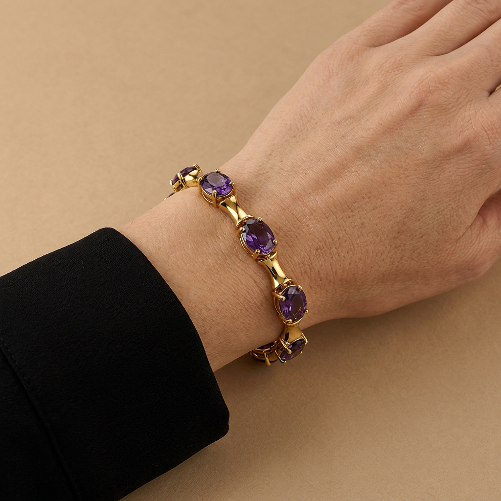 Montreux purple faux stone bracelet worn with a black sleeve