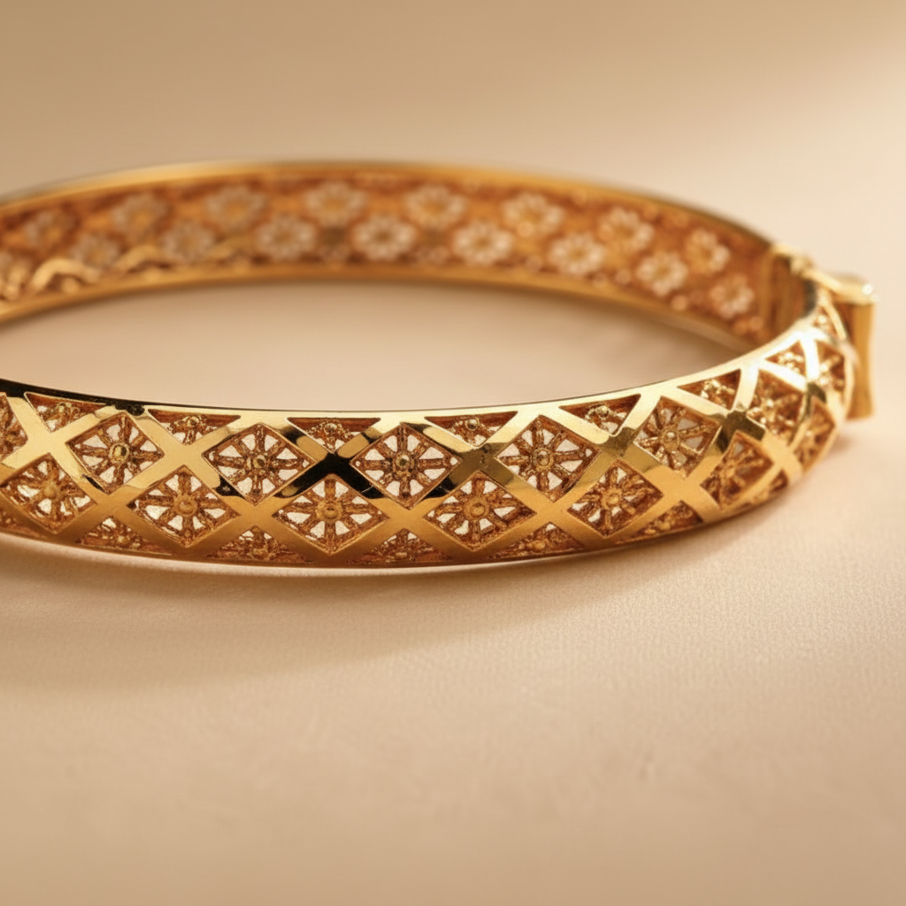 Riviera gold floral filigree bangle close-up detail
