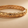 Riviera gold floral filigree bangle close-up detail