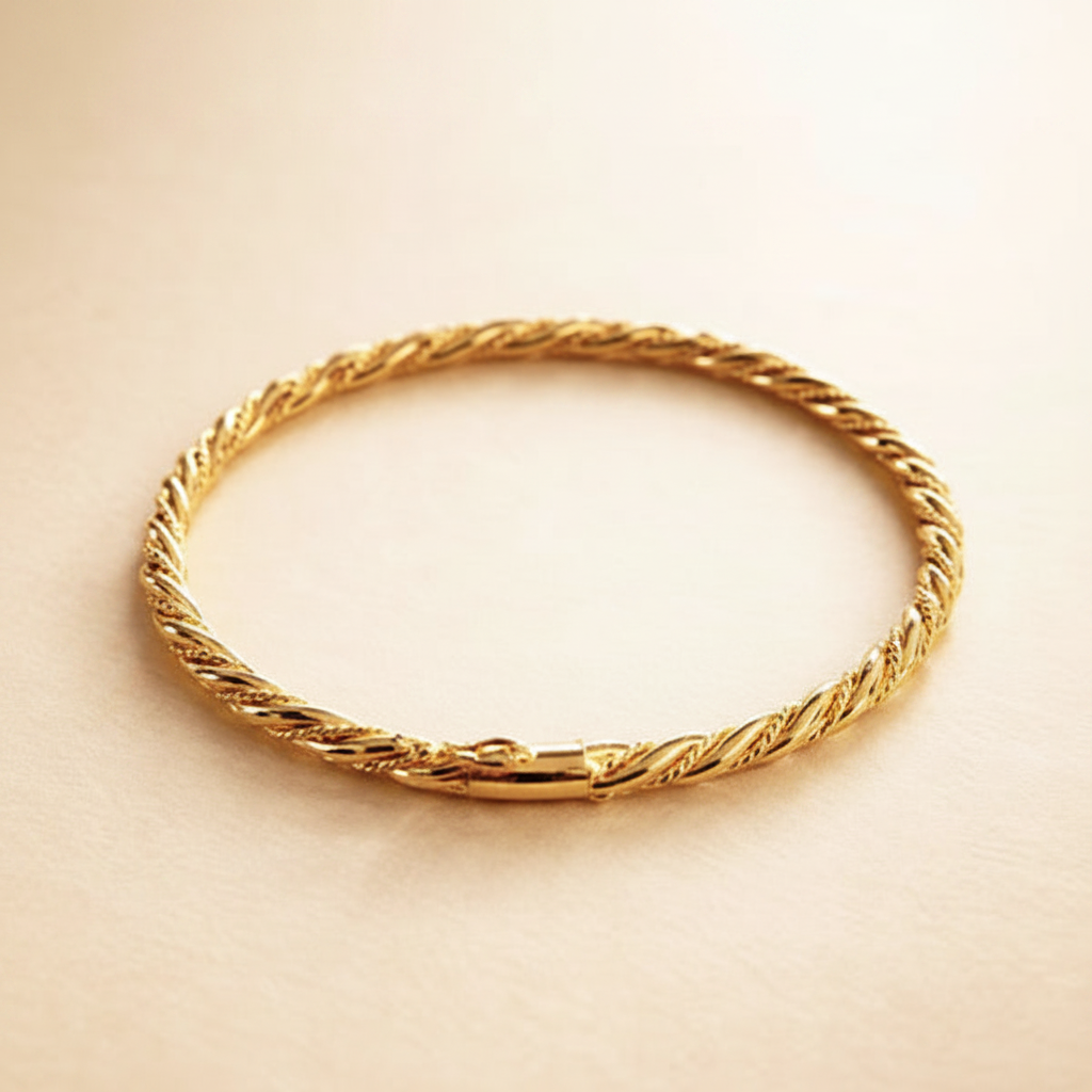 Langley slim closed gold twisted rope bangle close-up texture detail