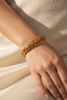 Riviera gold floral filigree bangle on-wrist single wear