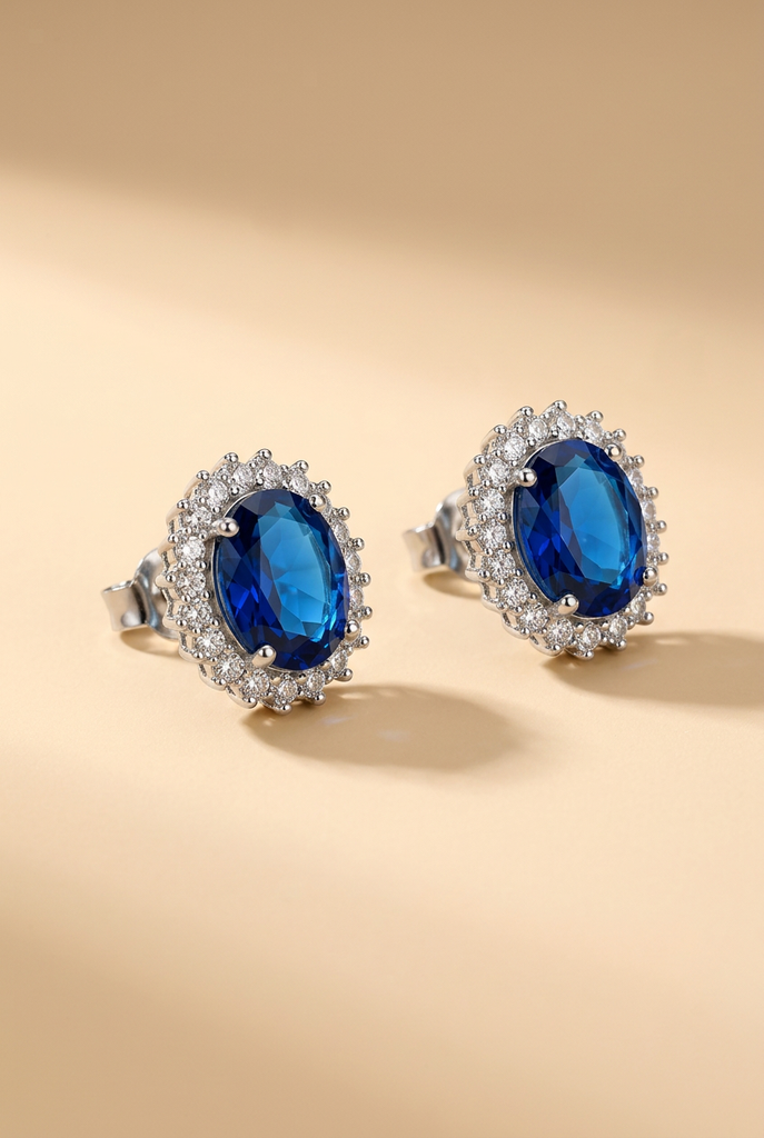 Vinan blue faux sapphire halo stud earrings on ivory