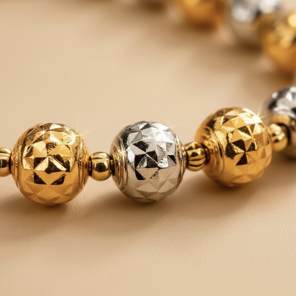 Oslo two-tone diamond-cut ball bracelet close-up texture detail