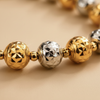 Oslo two-tone diamond-cut ball bracelet close-up texture detail