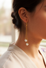 Olivia pearl drop earrings on-neck romantic lifestyle shot