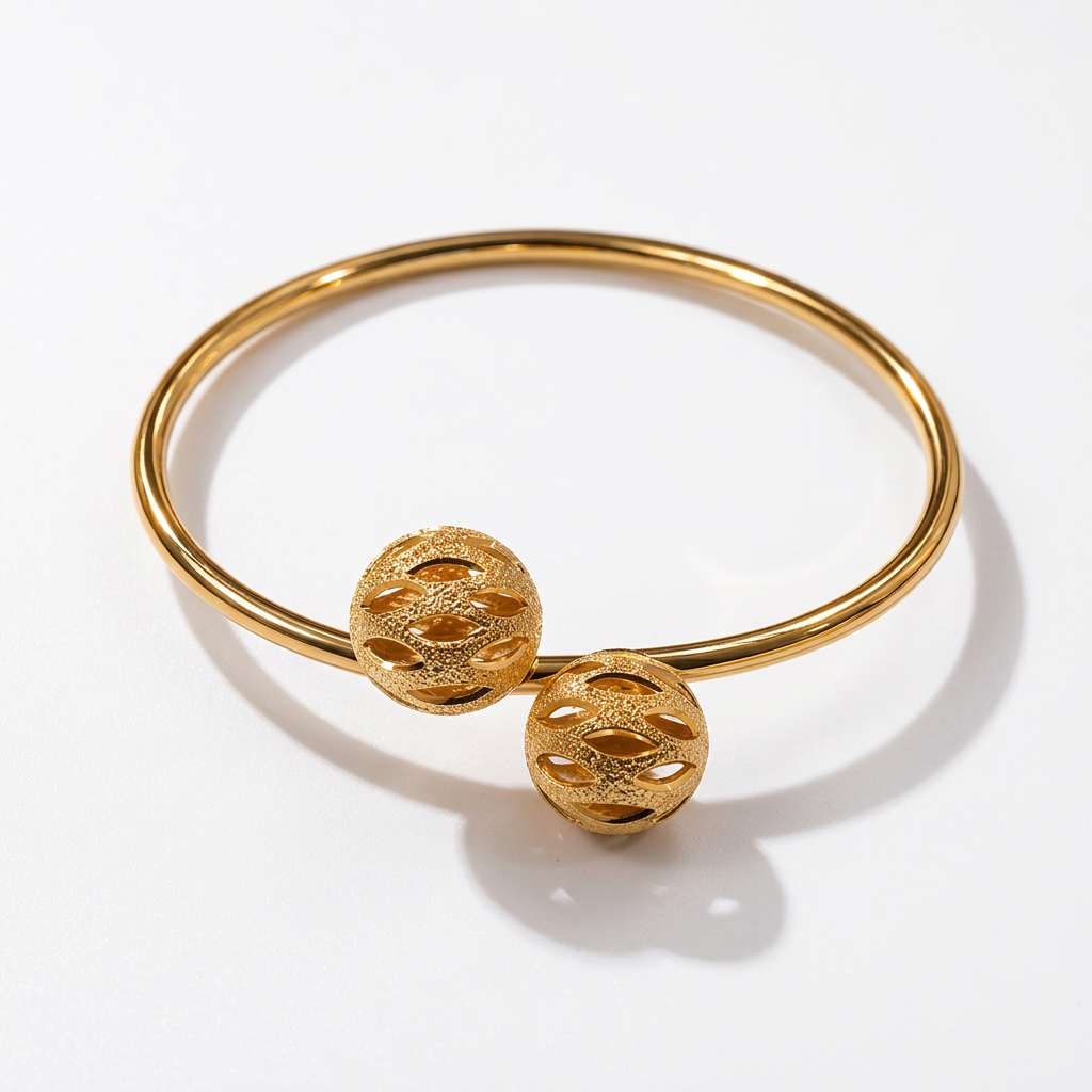 Leighton gold-dipped filigree ball cuff bracelet on white