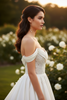 Olivia pearl drop earrings styled with bridal evening gown