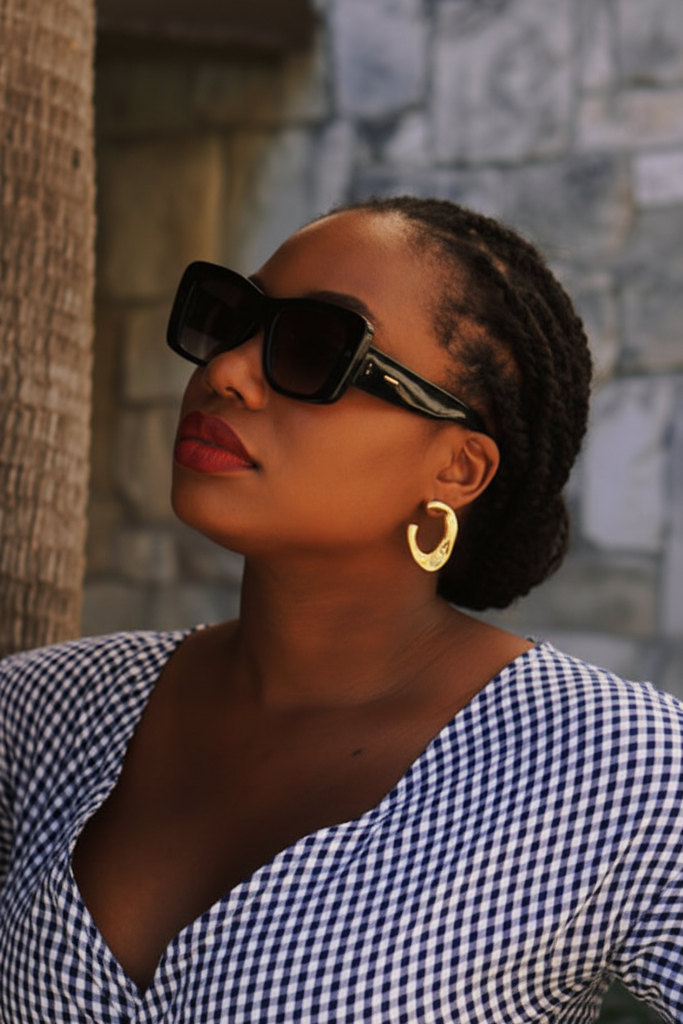 Melanie abstract crescent gold huggie hoop earrings on-ear lifestyle