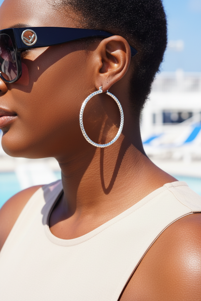 Citali white gold diamond-cut hoop earrings on-ear lifestyle editorial shot