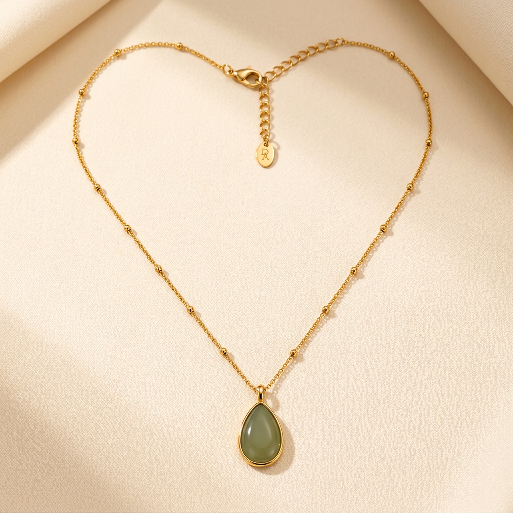 Diya green resin teardrop pendant necklace on ivory