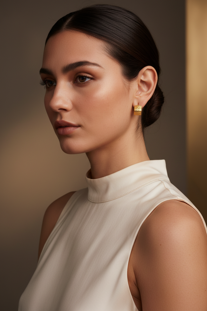 Luca gold textured box hoop earrings styled with elevated evening look