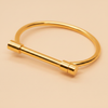 Kantuka bar bangle bracelet close-up gold bar closure detail