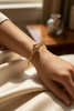 Celeste gold cat head cuff bracelet on-wrist lifestyle