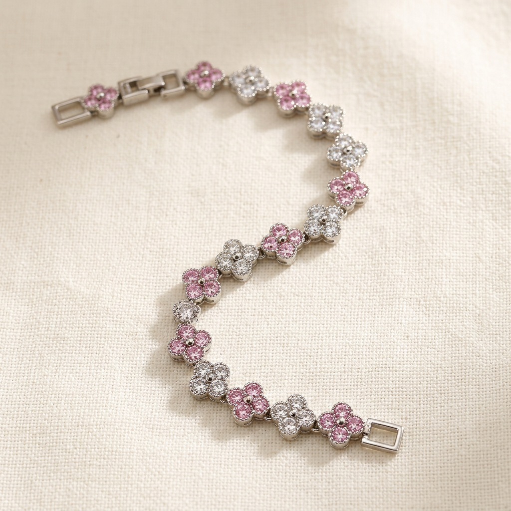 Pink and clear clover bracelet on ivory linen