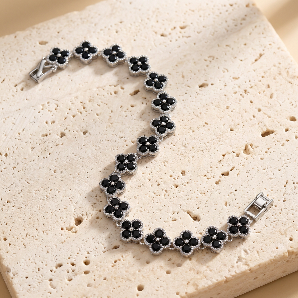 Black clover bracelet on pale ivory stone