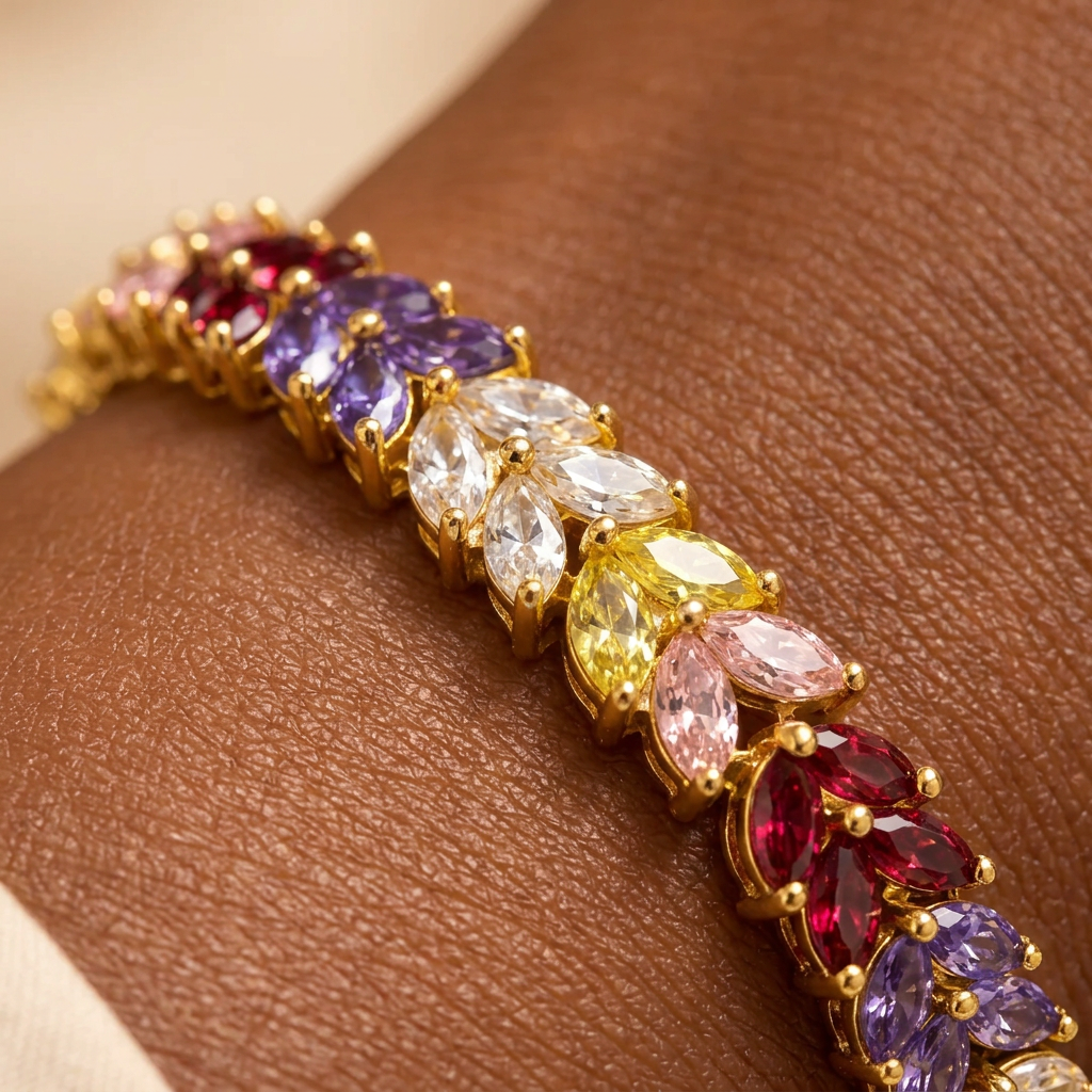 Close-up of the marquise-cut multicolor stones and gold-tone settings on the Harrison bracelet