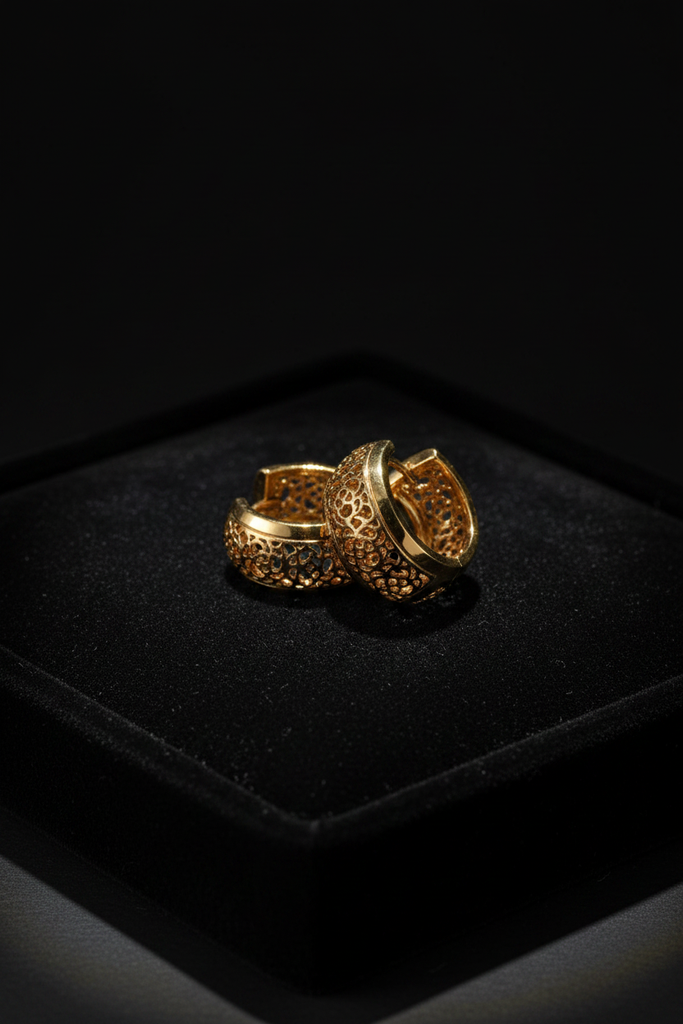 London mini gold filigree hoop earrings on dark velvet jewelry tray