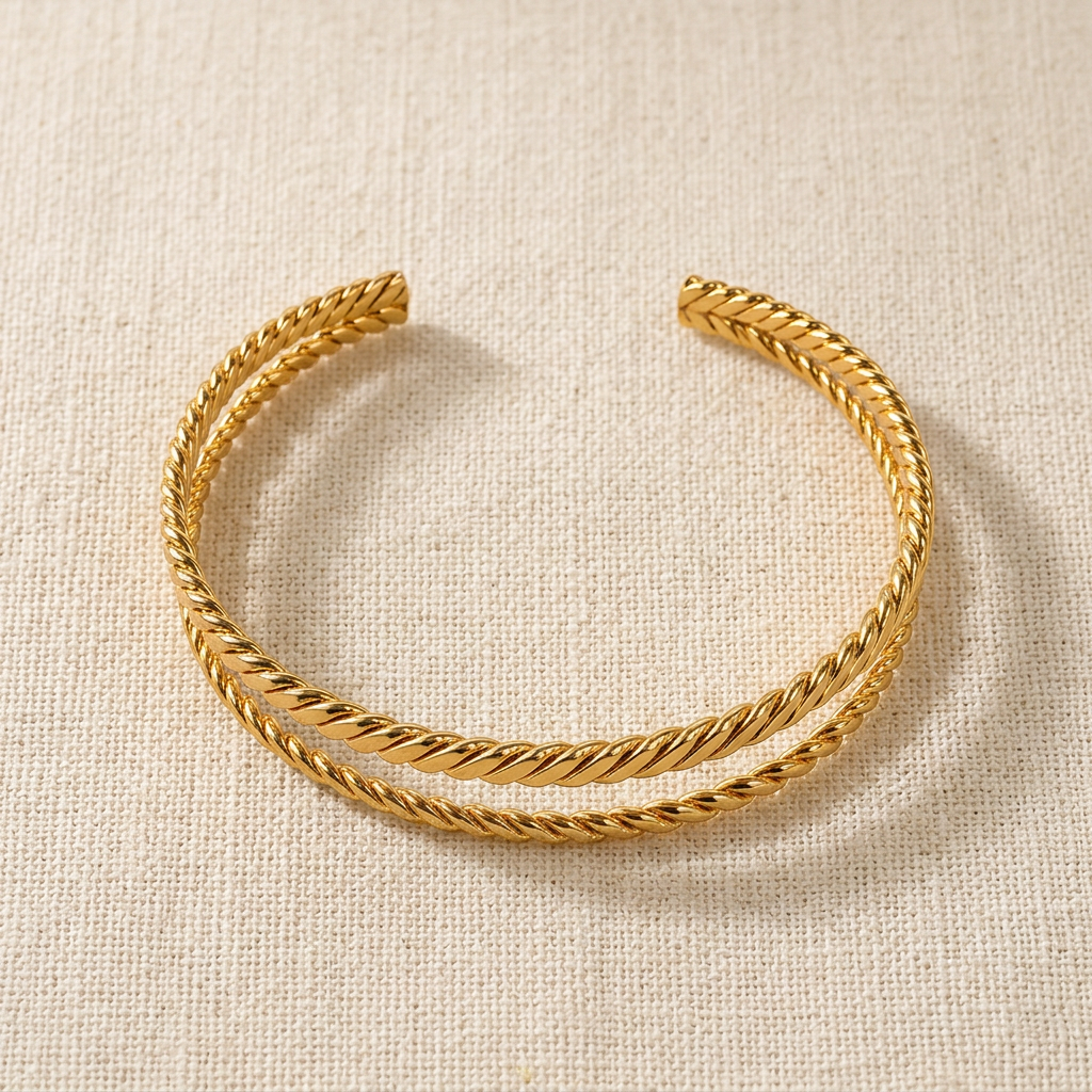 Matteo double-band twist cuff bracelet on cream linen