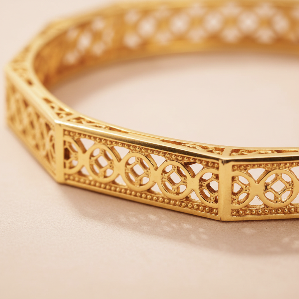 Charlotte gold octagonal quatrefoil filigree bangle close-up panel detail
