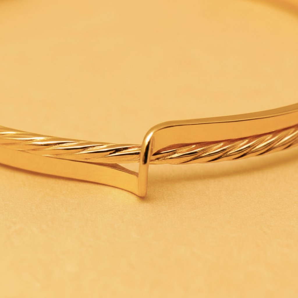 McKinley dual-texture gold open cuff bracelet close-up folded overlap detail