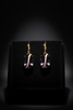 Dakota purple stone drop earrings with lab diamond accent on dark velvet tray