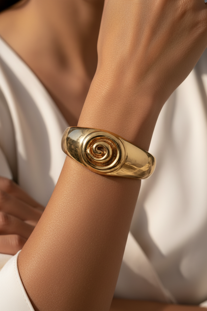 Isadora gold spiral cuff bracelet on-wrist lifestyle