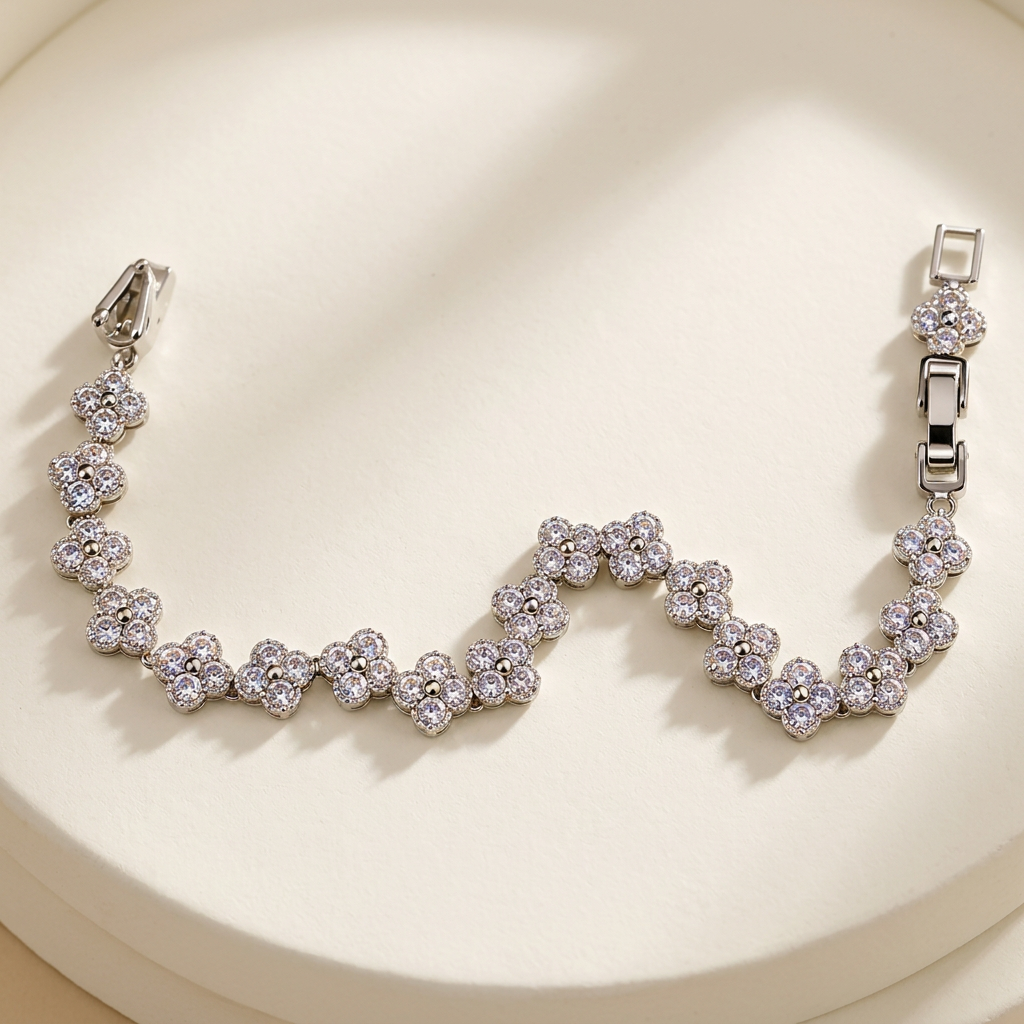 White crystal clover bracelet on an ivory background