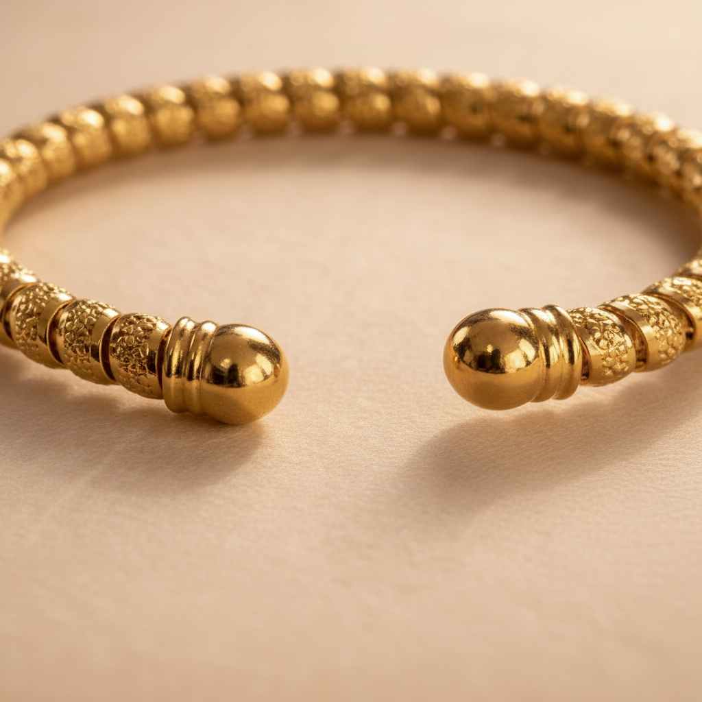 Liya textured beaded gold open cuff bracelet close-up coiled bead and ball end cap detail