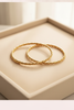 Langley slim closed gold twisted rope bangle cream velvet tray display
