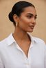 Cannes Sculptural Hoop Earrings - lifestyle white linen sleek updo