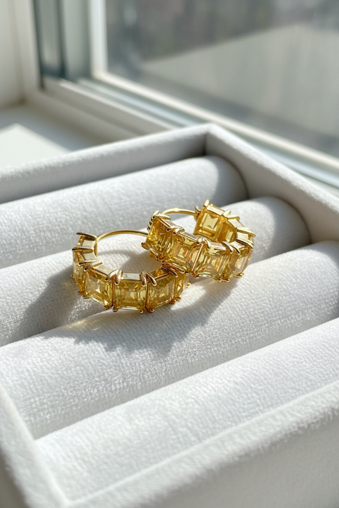 Kennedy yellow citrine stone huggie hoop earrings on white velvet tray