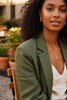 Tallulah gold filigree huggie hoop earrings styled with casual chic everyday outfit