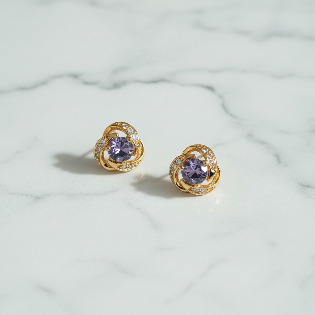 Langlet purple stud earrings flat lay on white marble surface