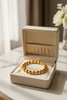 Eleanor gold diamond-cut ball bead bracelet gift display on velvet tray